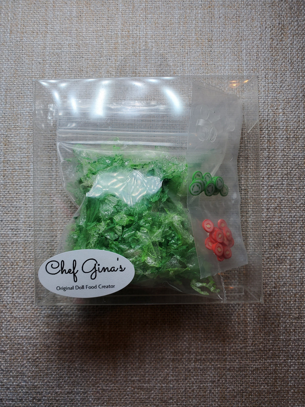 Chef Gina's miniature salad kit for dolls featuring realistic lettuce and vibrant toppings