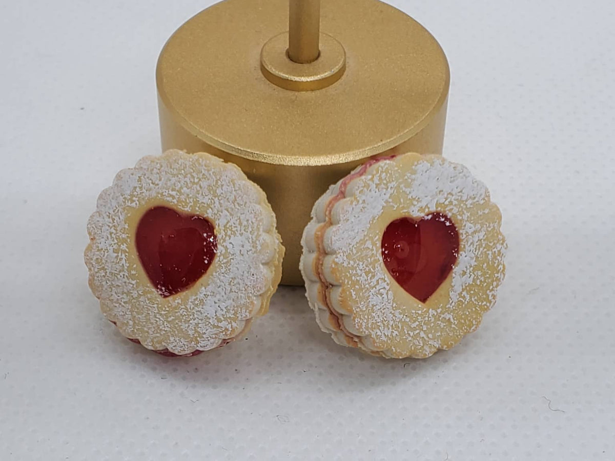 Chef Ginas European Linzer cookie dangle earrings with red heart center and powdered sugar detail