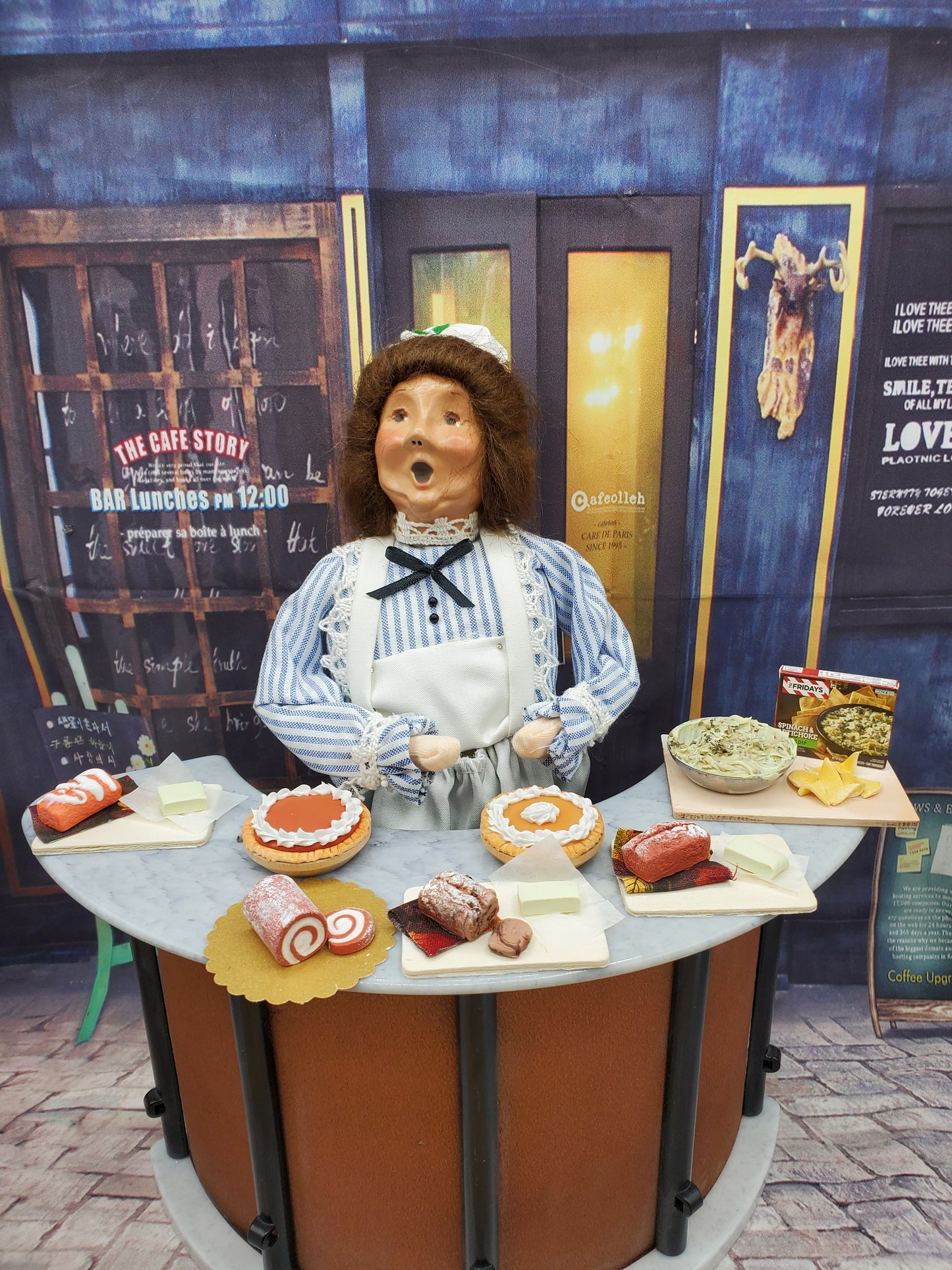Chef Gina's miniature chocolate loaf bread displayed with assorted baked goods on a Halloween-themed table