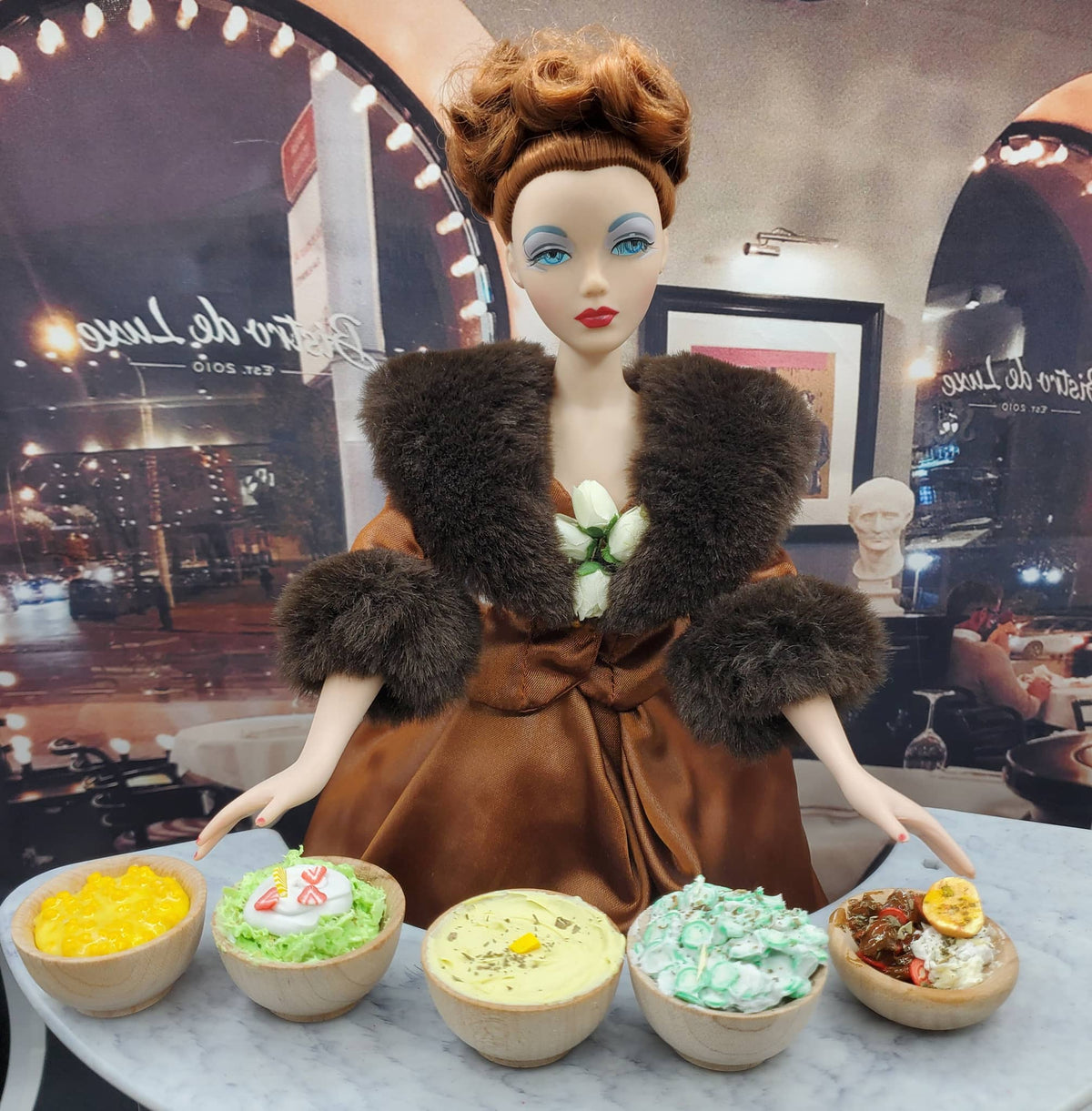 Chef Ginas miniature cucumber salad for dolls displayed with other side dishes in wooden bowls