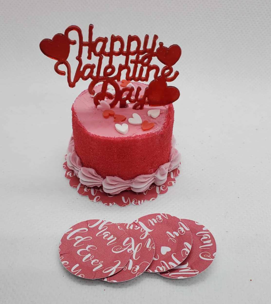 Chef Gina's miniature Valentine's Day cake doll accessory with pink frosting and Happy Valentine Day topper