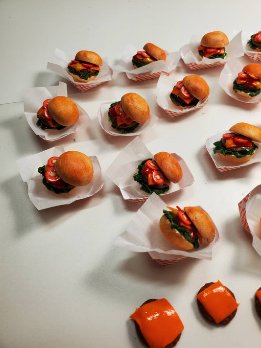 Chef Gina's mini 1:6 scale cheeseburger for dolls with lettuce and tomato in miniature paper trays
