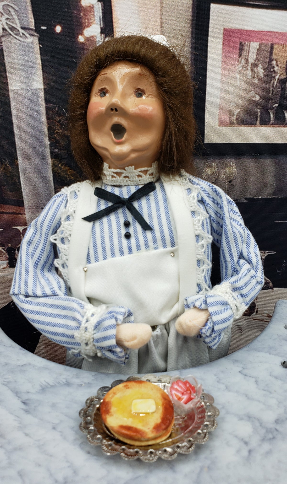 Chef Gina's Mini Food plate with tiny pancakes for dolls served with butter and syrup in front of a doll figure