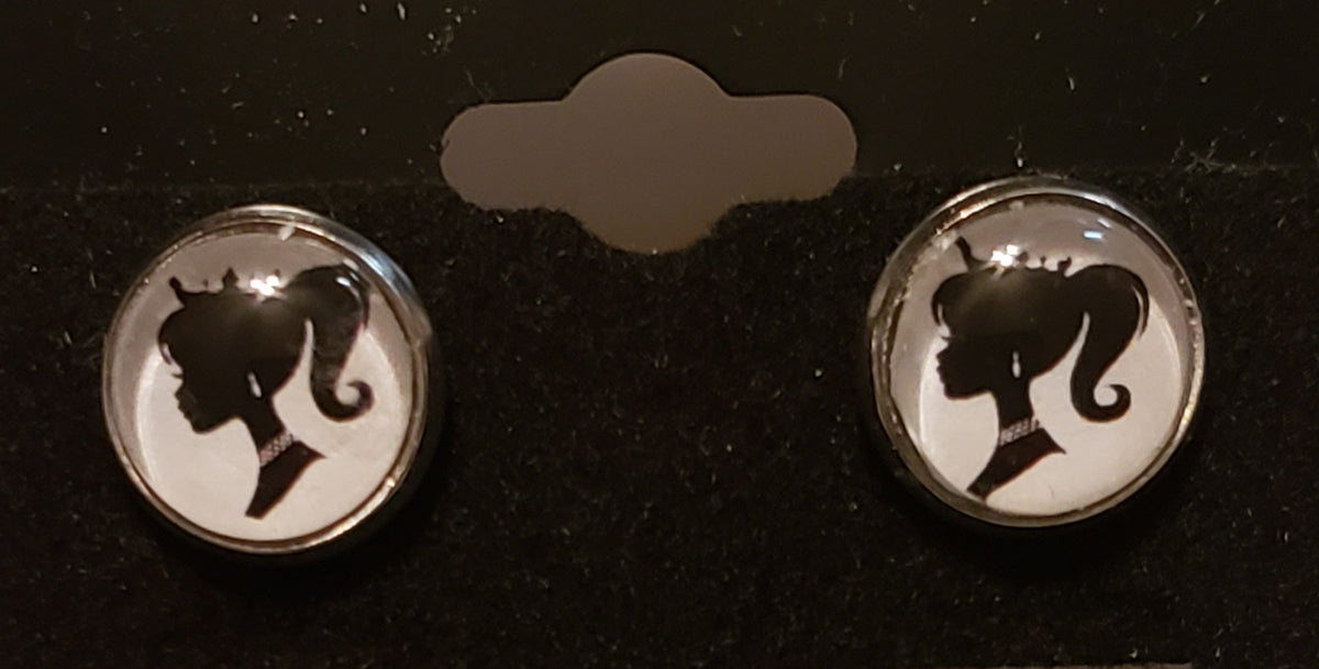 Black and white Barbie necklace set featuring silhouette silhouette earrings with ponytail design