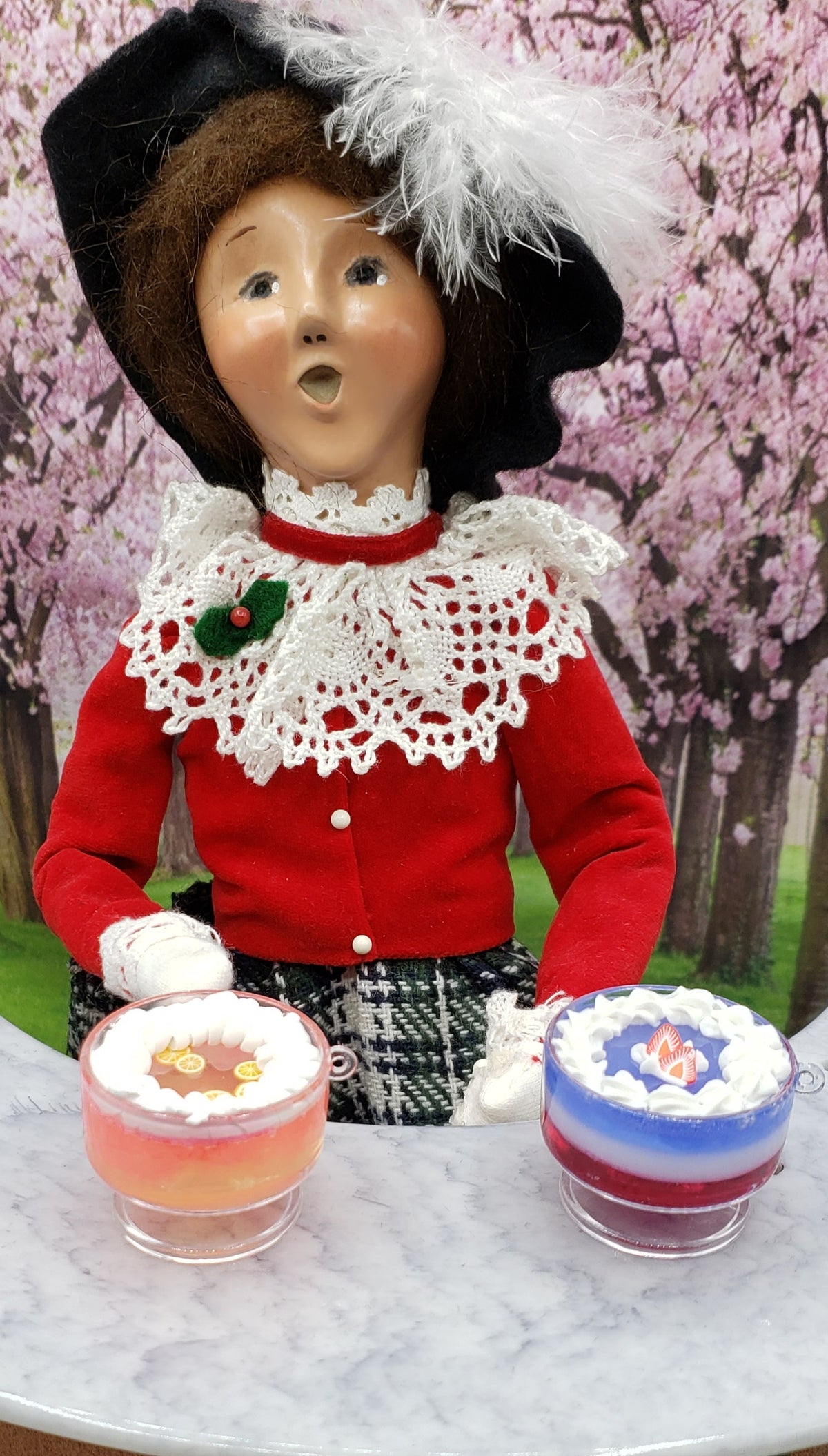 Chefginas miniature jello trifle served in clear cups, colorful layers with whipped cream topping