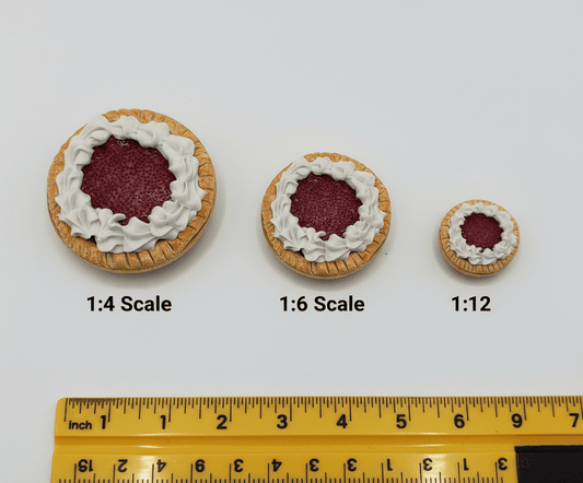 Miniature cherry pie scale comparison showing correct proportions for 1:6 scale doll food by Chef Gina's