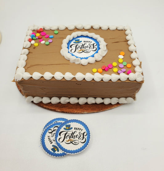 1:4 scale Father's Day chocolate cake with colorful decorations and a festive logo