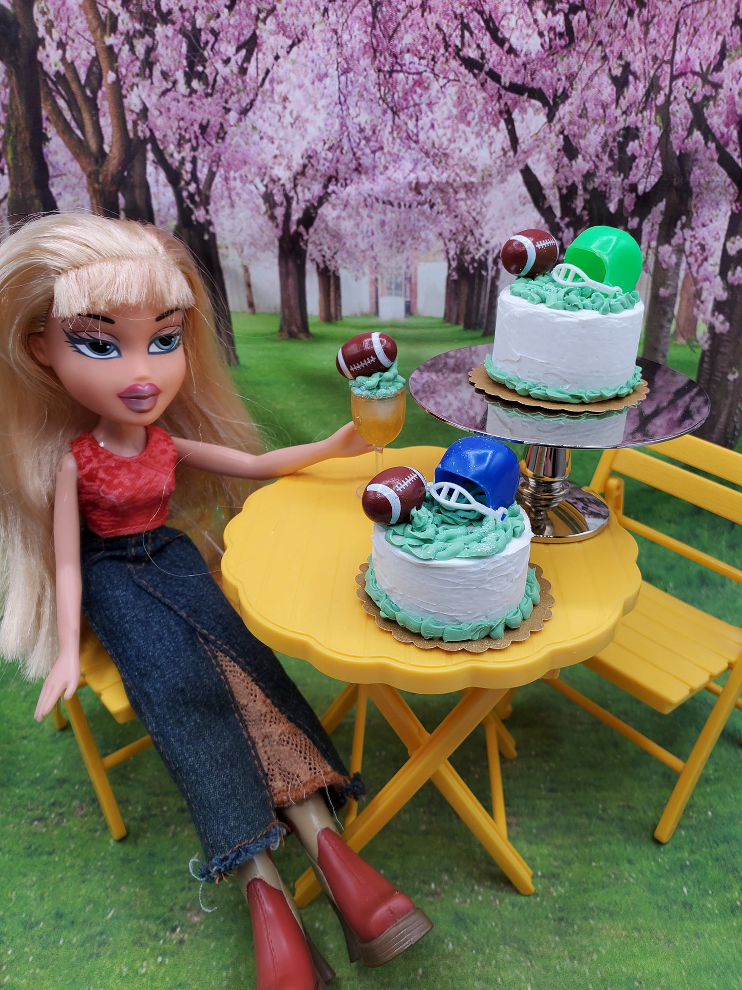 1 6 scale doll football drinks with themed cakes and football decorations on yellow table outdoors