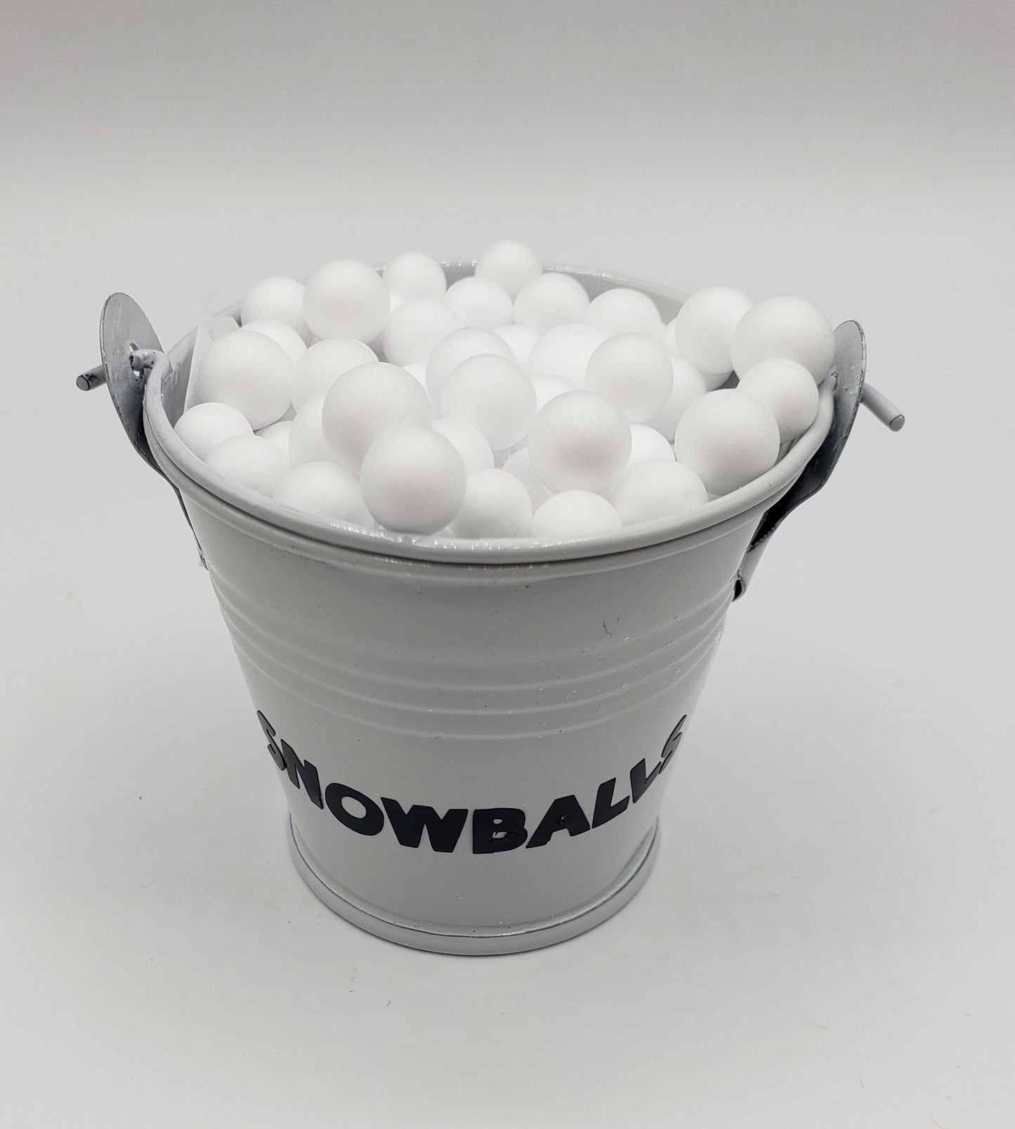 Fake snow balls in bucket