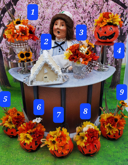 floral displays with byers choice doll