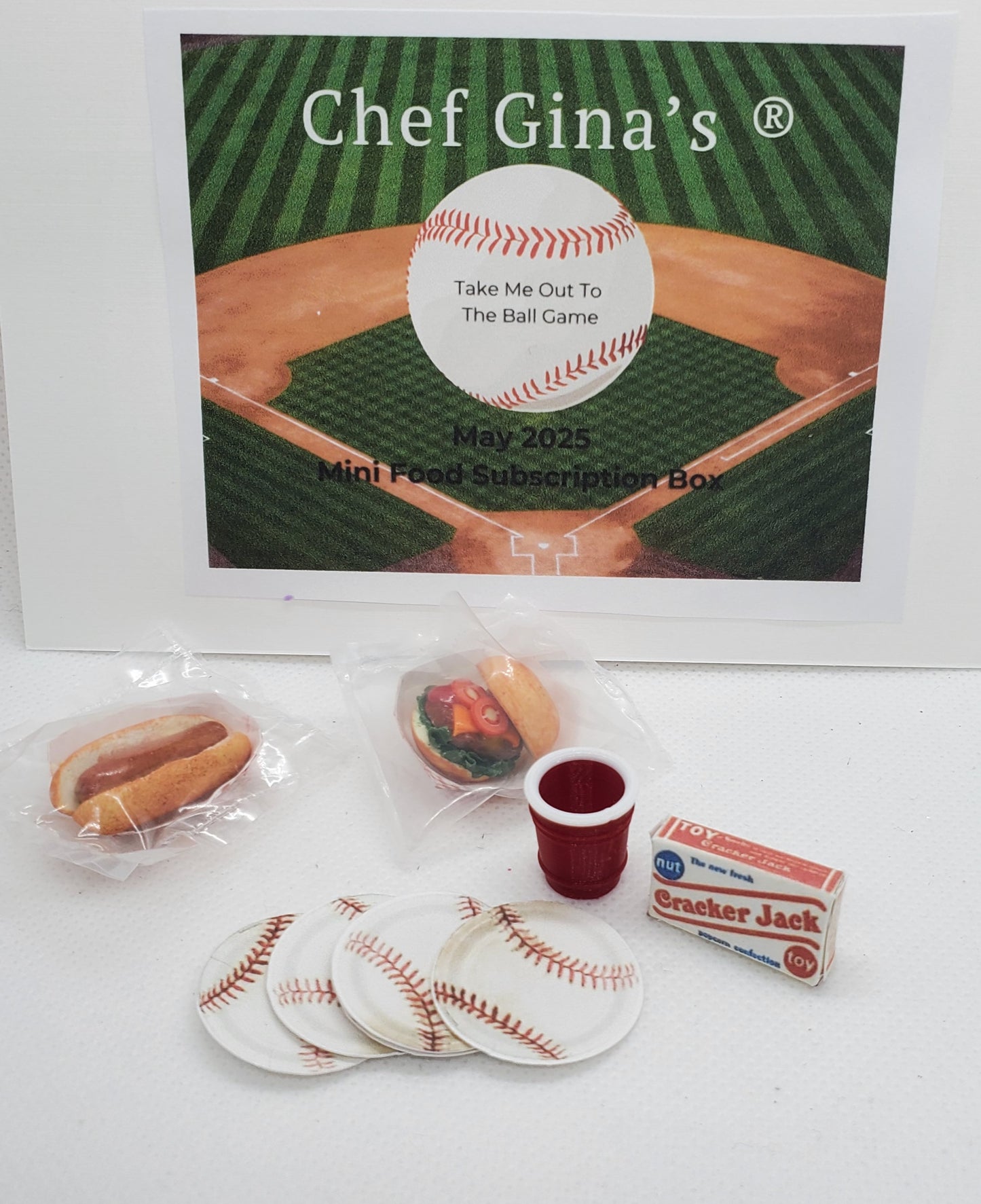 Chef Gina's 1:6 scale doll food subscription box with mini ballpark snacks including hot dogs and cracker jacks
