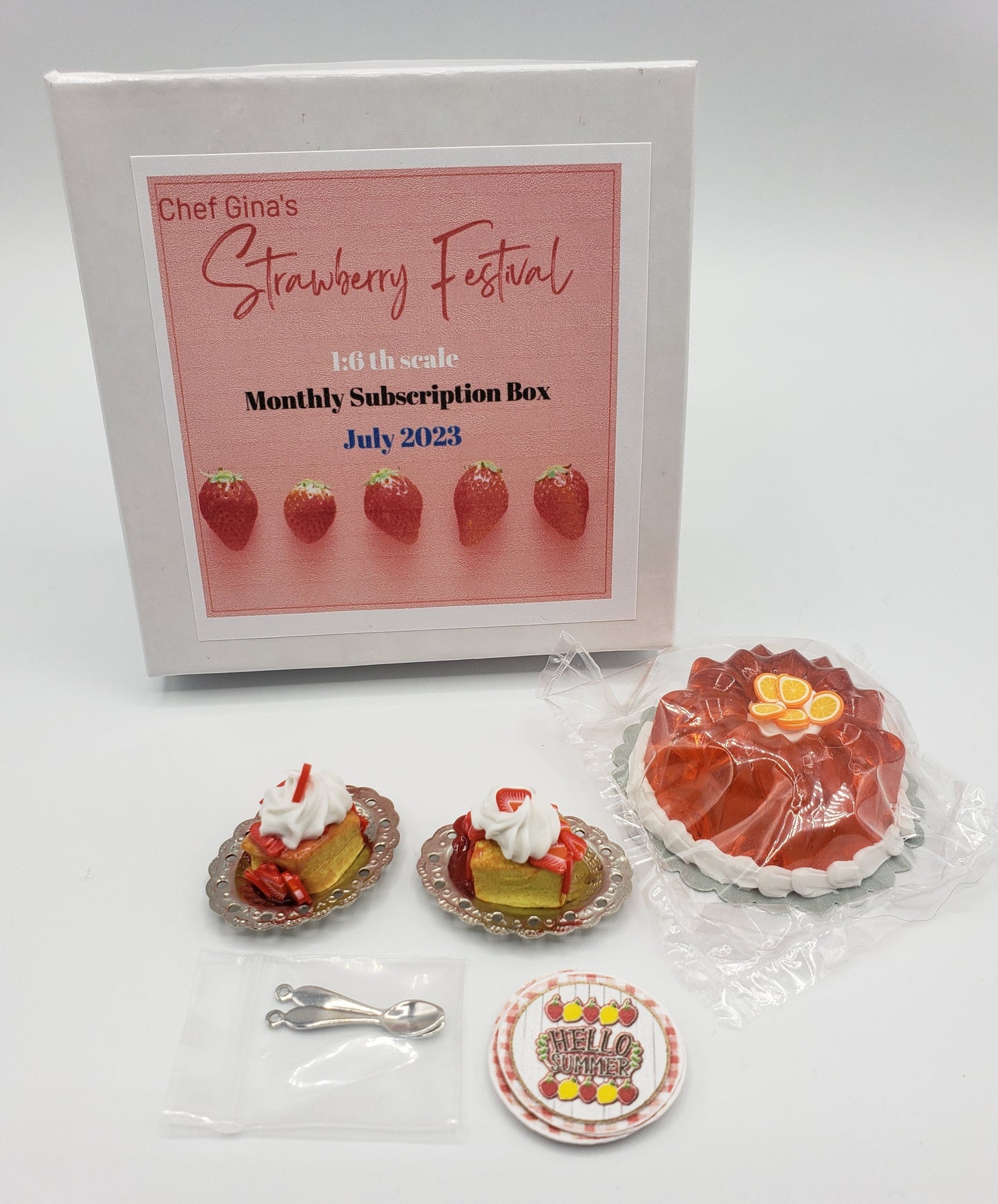 Chef Gina's 1:6 scale doll food subscription box with strawberry dessert and accessories for collectors