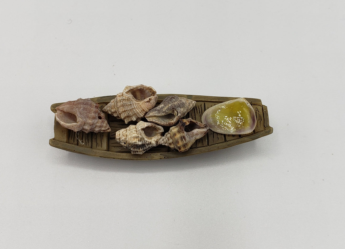 Chef Gina's mini food doll sized conk appetizers displayed on a small wooden serving tray