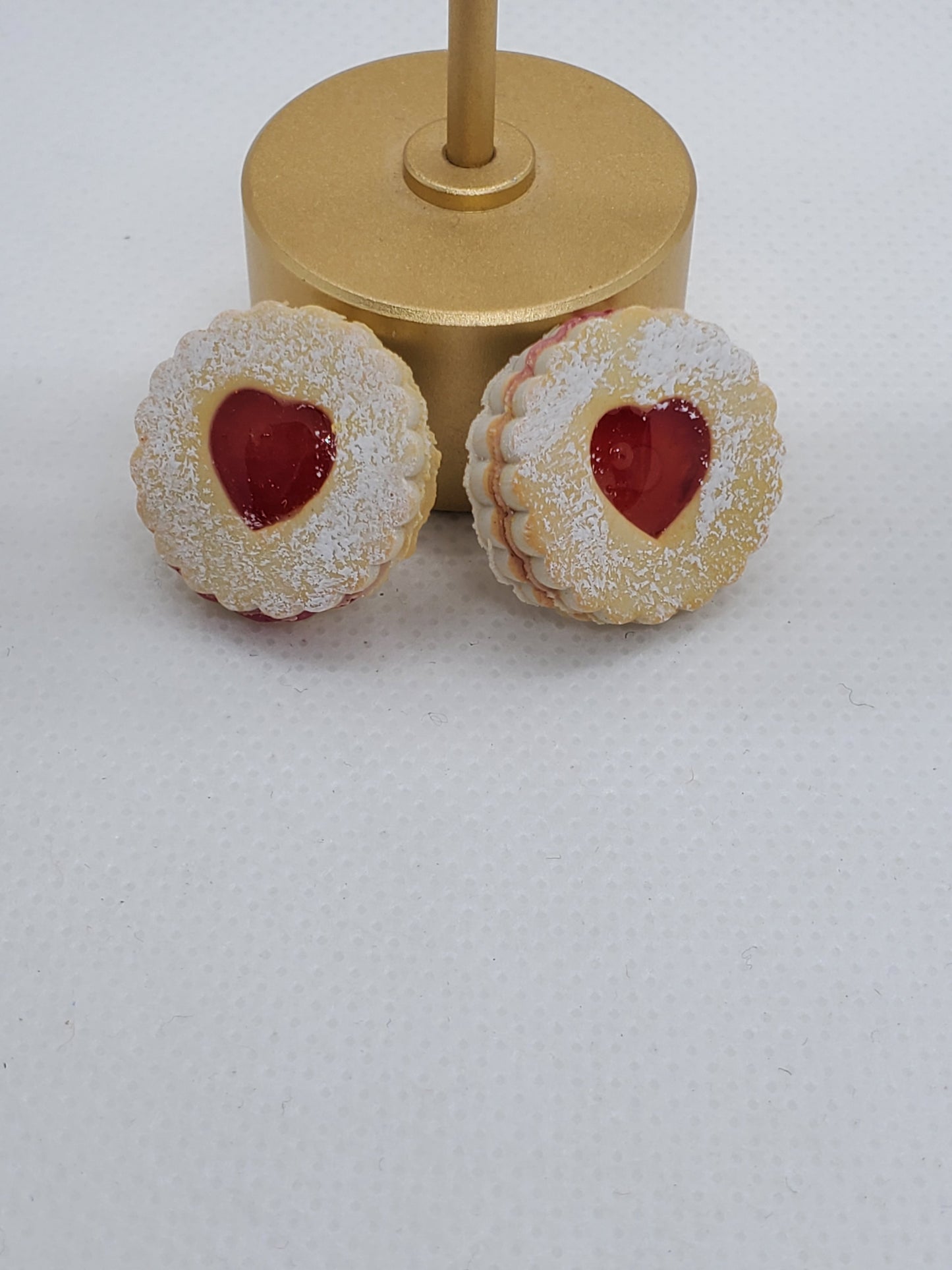 Chef Ginas European Linzer cookie dangle earrings with red heart center and powdered sugar detail
