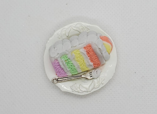Chef Gina's Mini Food Fashion Doll Sherbet Cake on a decorative plate with a silver fork