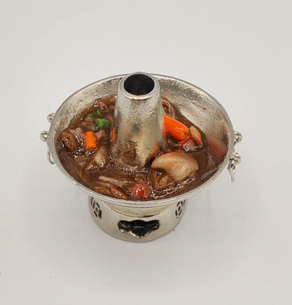 Chef Ginas handmade doll stew pot with detailed miniature vegetables and broth in silver metal