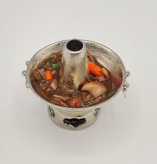Chef Ginas handmade doll stew pot with detailed miniature vegetables and broth in silver metal