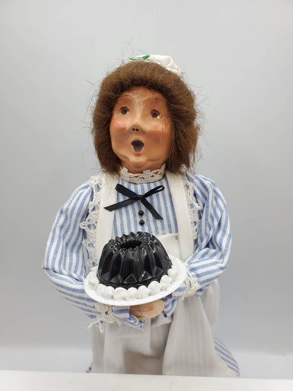 Chef Gina's Mini Food Doll Holding a Classic Jello Mold in a Blue and White Striped Outfit