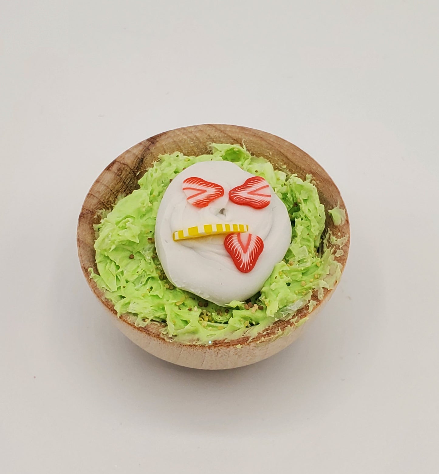 Chef Gina's mini pistachio dessert for dolls with green salad and heart decorations in wooden bowl