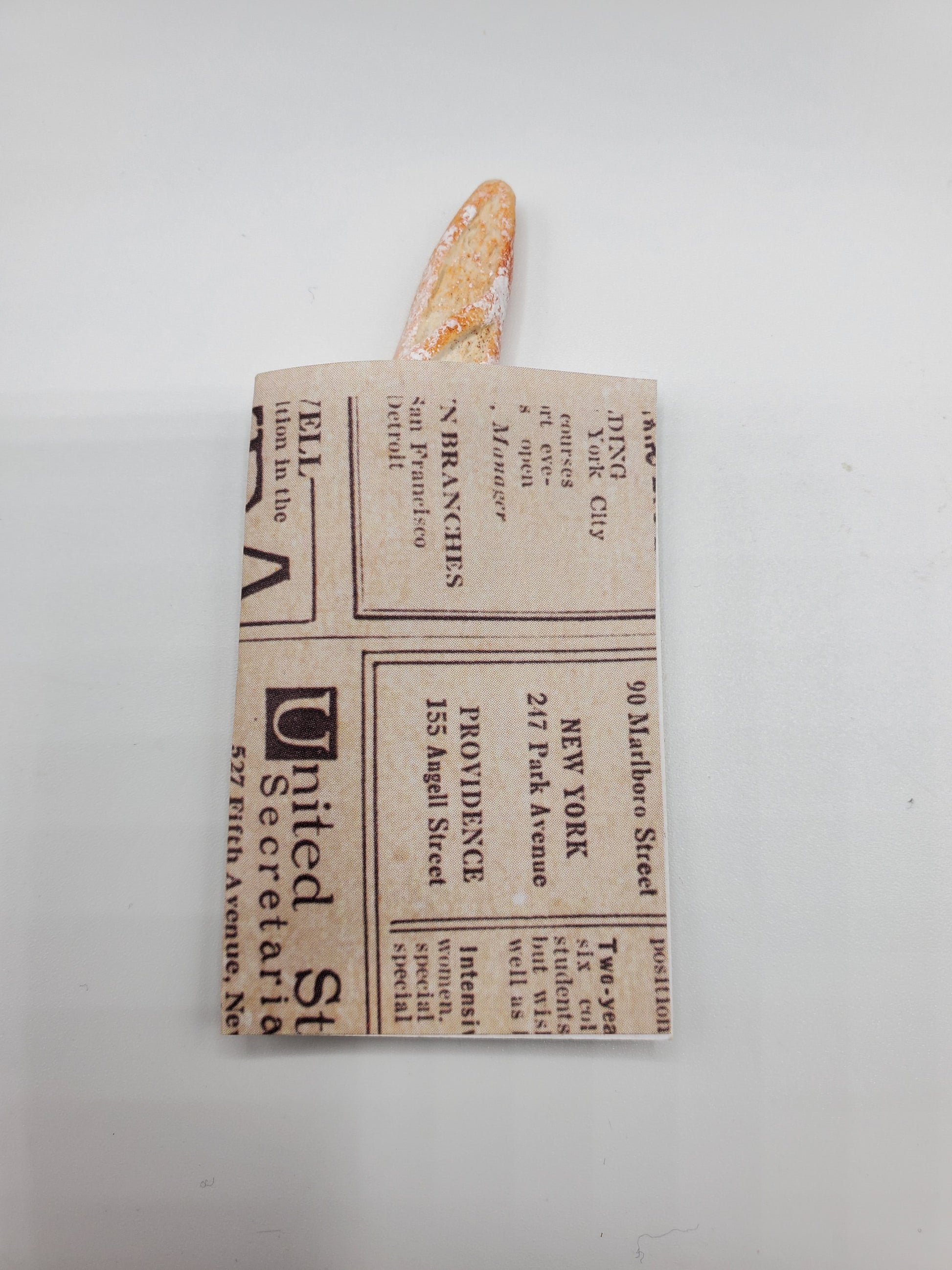 Chef Gina's Mini Food miniature baguette bread wrapped in vintage newspaper style paper