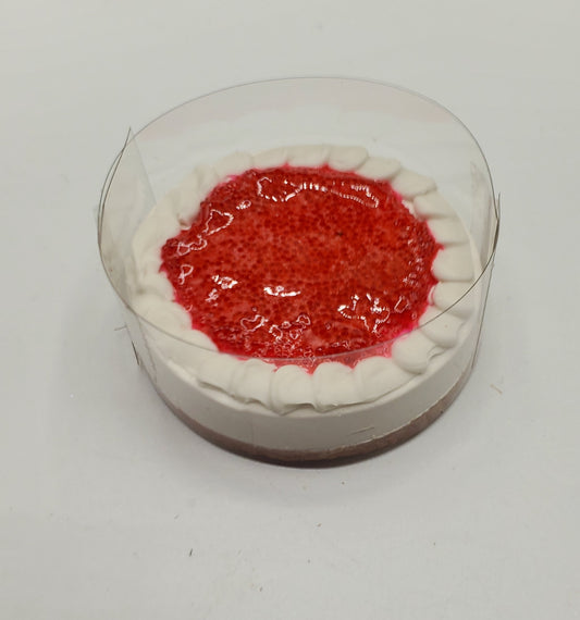 Chef Gina's miniature cheesecake for dolls with strawberry topping and white cream border