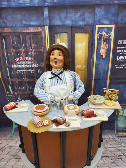 Chef Gina's miniature chocolate loaf bread displayed with assorted baked goods on a Halloween-themed table
