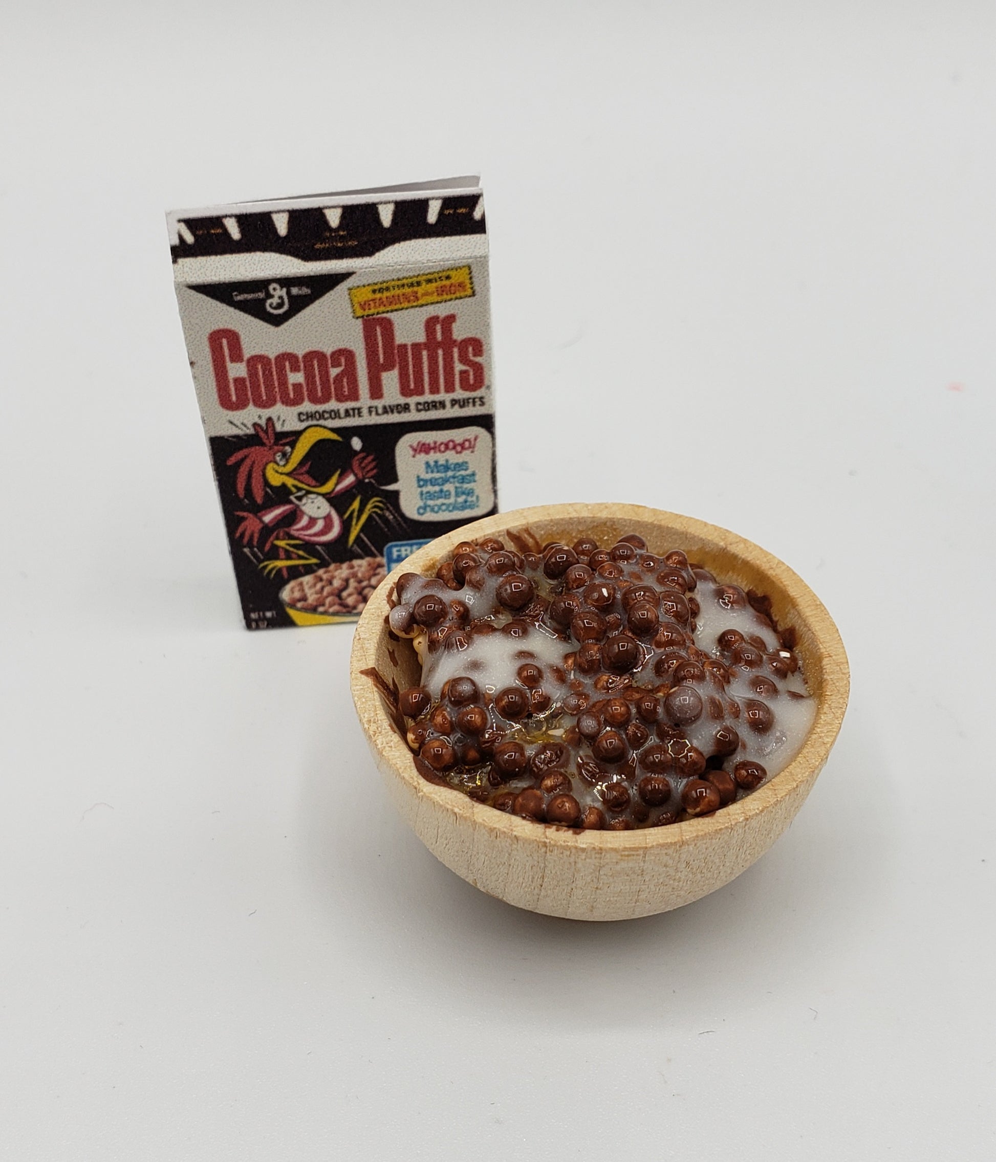 Miniature Coco Puffs cereal for dolls with chocolate cereal and milk in a wooden bowl by Chef Gina's
