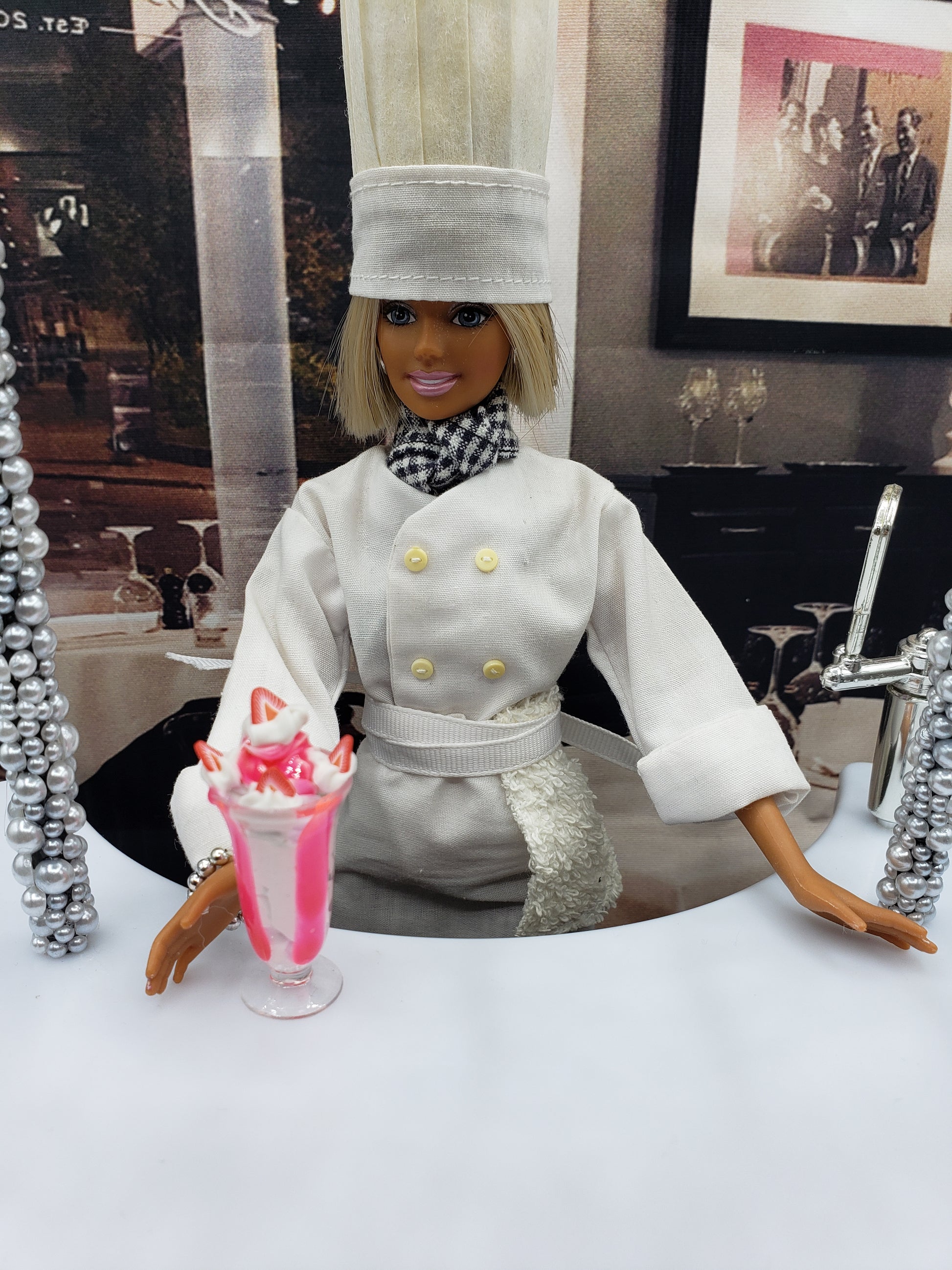 Chef Gina's miniature strawberry sundae for dolls with whipped cream and syrup in a glass cup