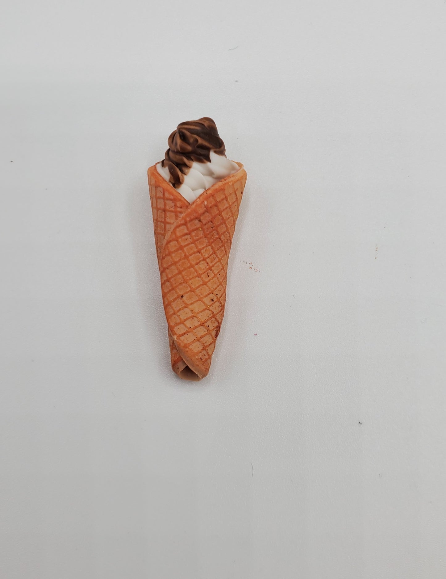 Chef Gina's miniature waffle cone ice creams with chocolate and vanilla swirled soft serve