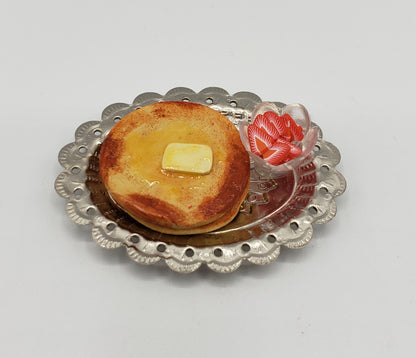 Chef Gina's miniature tiny pancakes for dolls served on a silver platter with a small glass bowl of strawberries