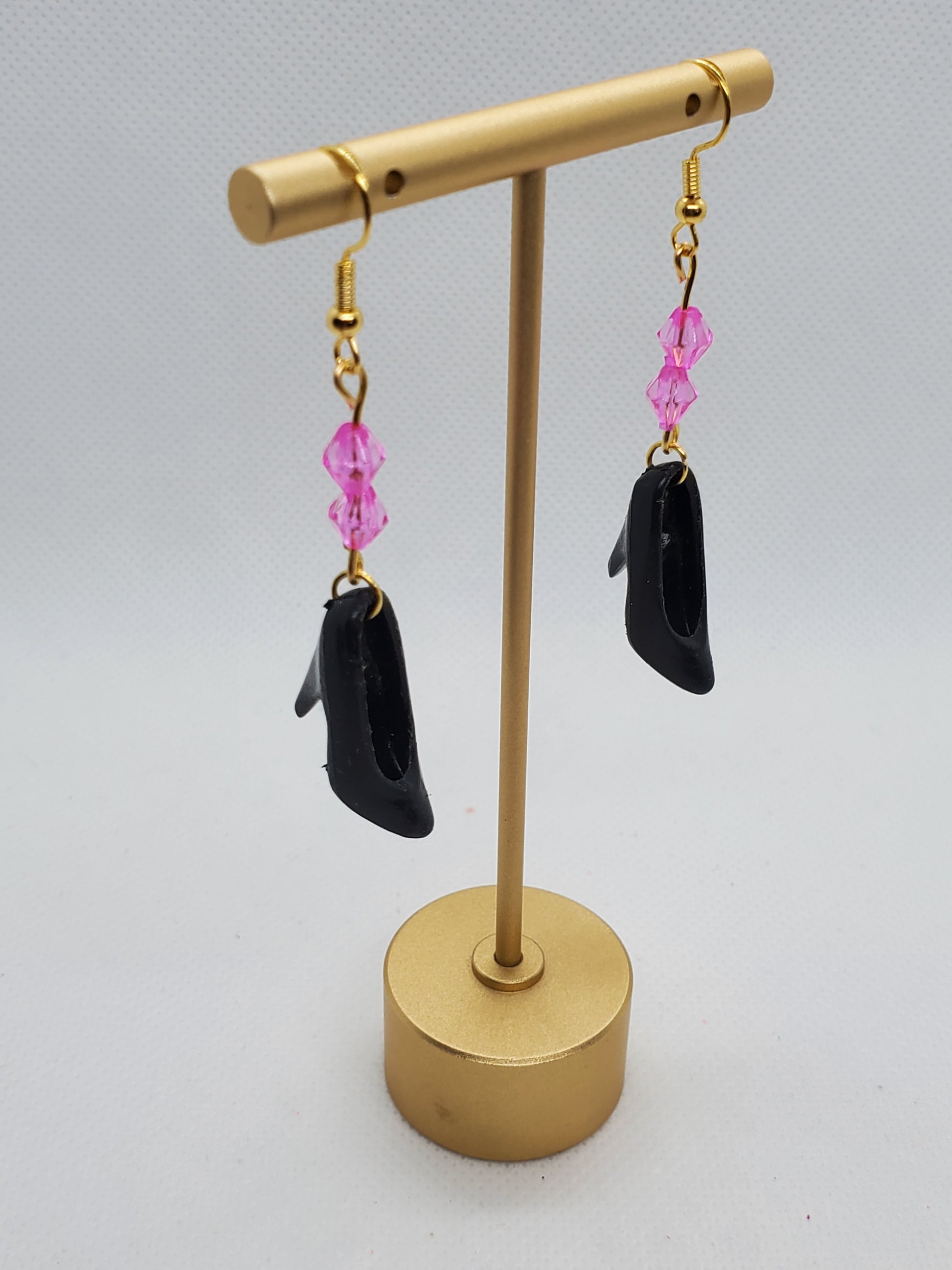 Chef Gina's vintage Barbie shoe earrings with black miniature heels and pink bead accents