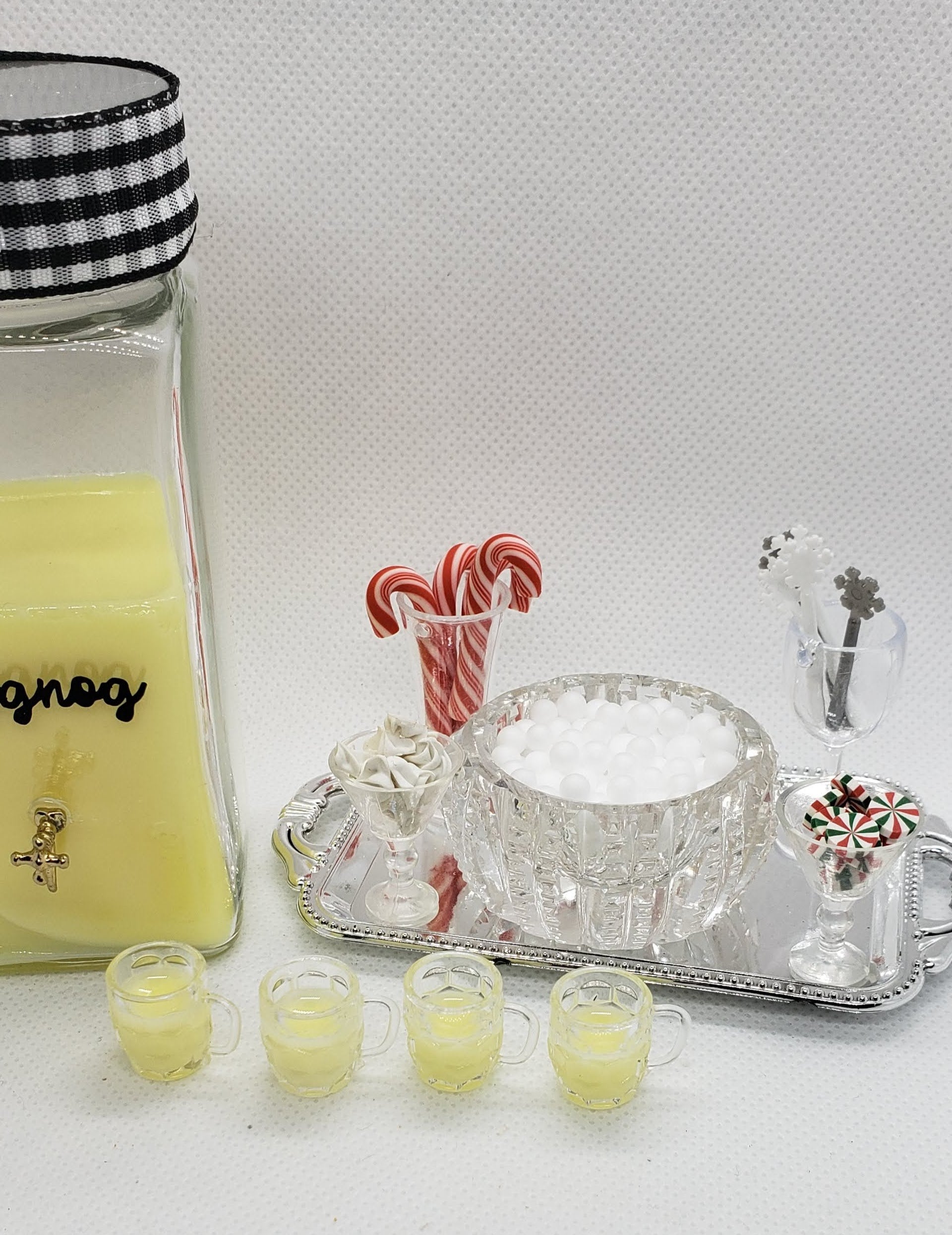 1:6 scale eggnog set with a glass pitcher, mini cups, and festive toppings for dollhouse decor