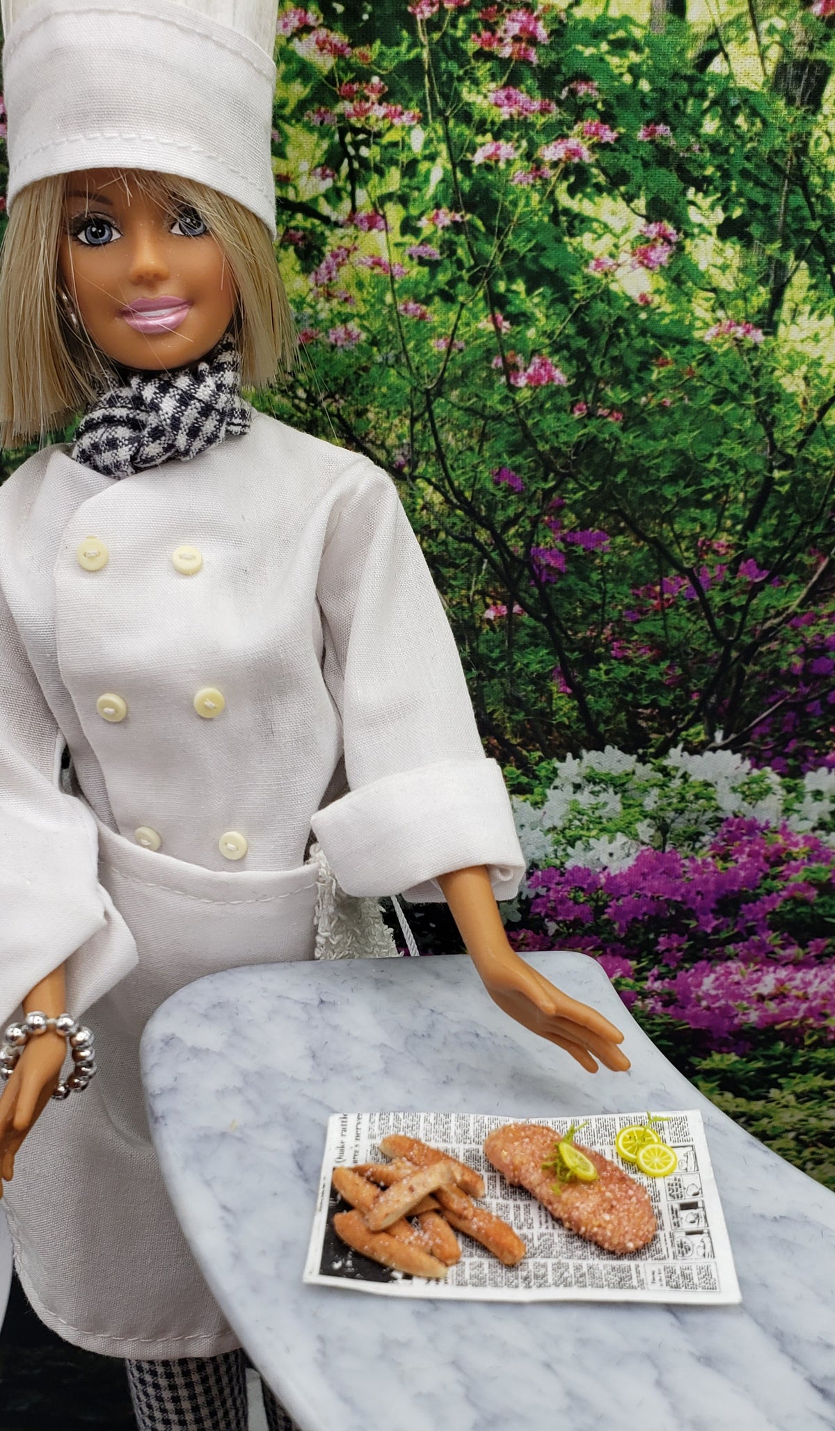 Chef Gina’s Mini Food doll accessories featuring miniature fried fish for dolls on a marble countertop