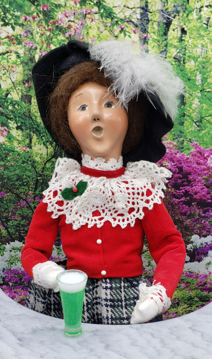 Chef Gina's 1 6 scale green beer prop for fashion dolls held by doll with red outfit and feathered hat